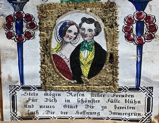 Ein kleines Bildchen mit einem Liebespaar und Spruch bunt koloriert