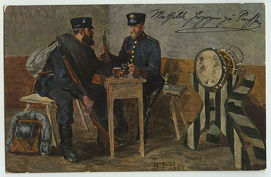 Zwei Soldaten an einem Tisch gegenüber sitzend