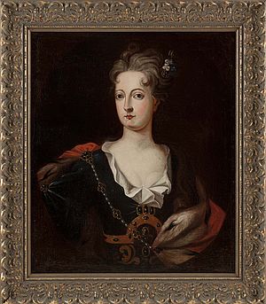 Gräfin Cosel auf einer zeitgenössischen Darstellung. Sie trägt ein dunkelblaues Kleid und einen roten Umhang. An Kleidung und im Haar trägt die dunkle Edelsteine und Blüten.