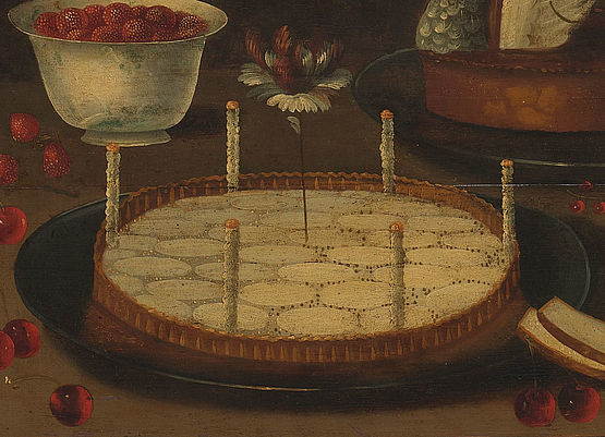 Gemälde einer Torte mit einer Blume in der Mitte