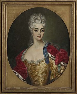 Ein zeitgenössisches Gemälde zeigt Gräfin Cosel in einem goldenen Kleid und einem purpurroten, pelzbesetzten Umhang. Dazu trägt sie wertvollen Perlenschmuck.